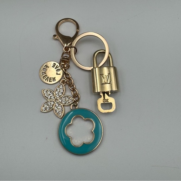 Louis Vuitton Accessories - Authentic Louis Vuitton Lock and Key on Unbranded Bag Charm Key Chain Teal Gold